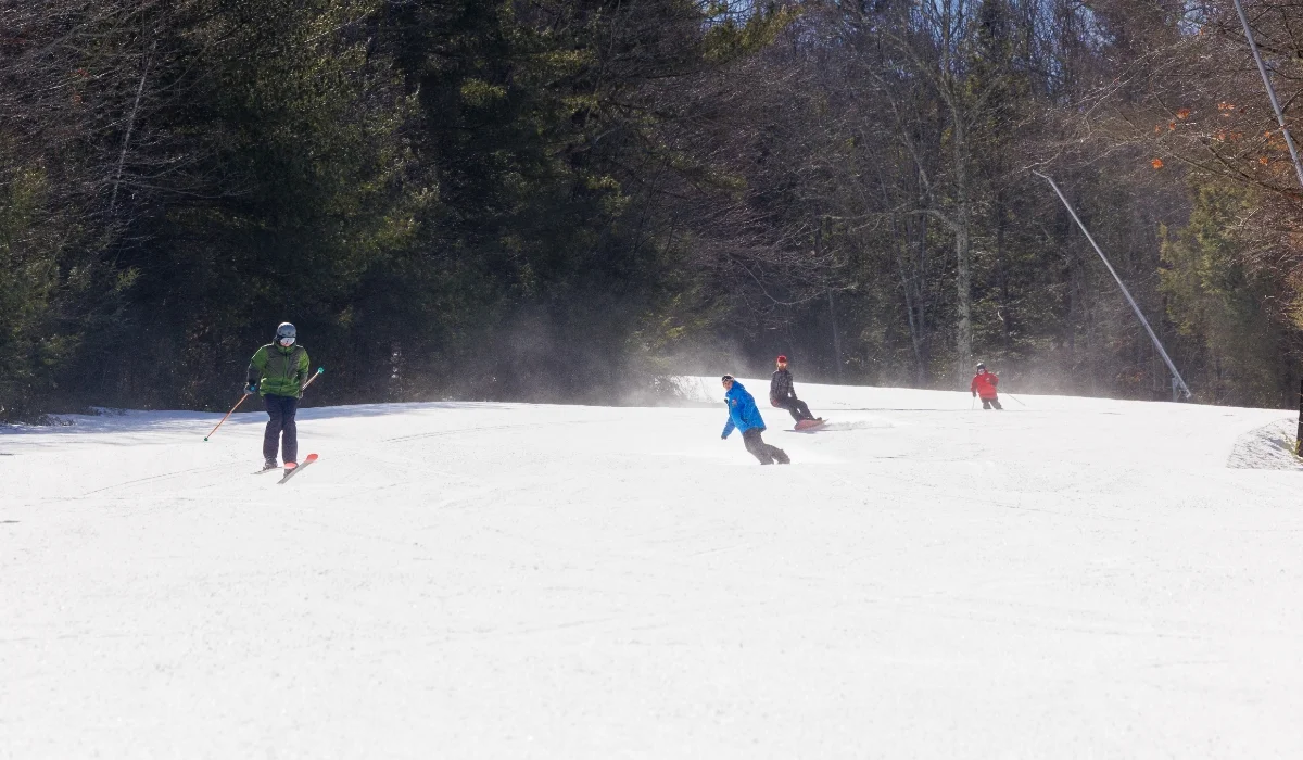 people skiing down mountain