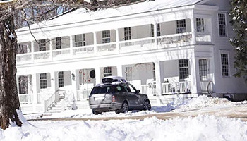snowy inn exterior