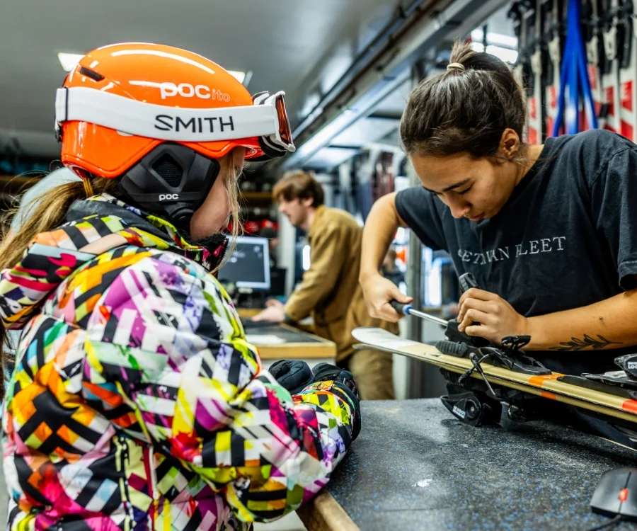 woman preparing ski rental