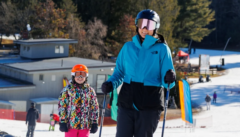 mother and daughter skiing
